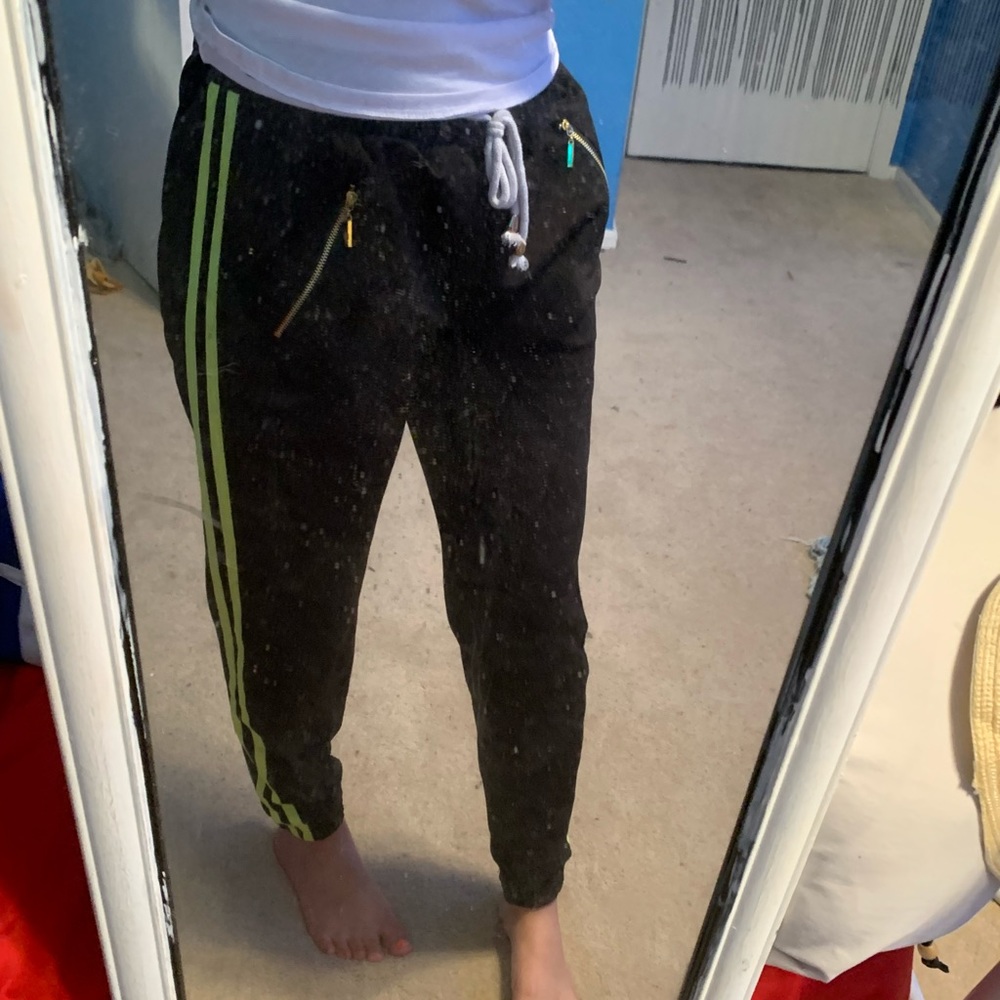 black joggers w lime green stripes on the side